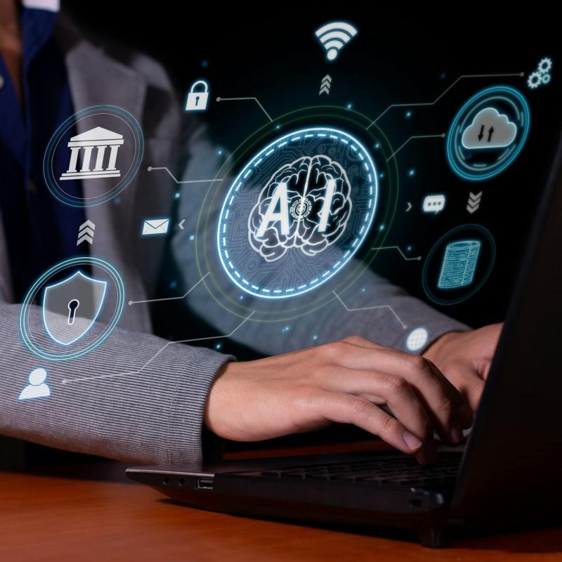 A man interacts with artificial intelligence to optimize and automate computing .jpg